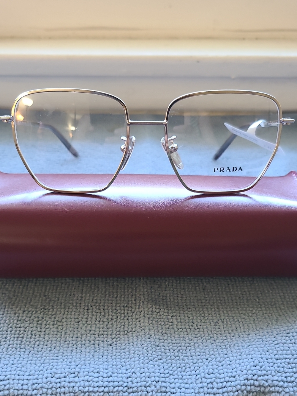 New & Authentic Prada Eyeglasses Model OPR-C51VD, Color Silver, Size 52-17-145